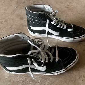 Dark green Vans high tops
